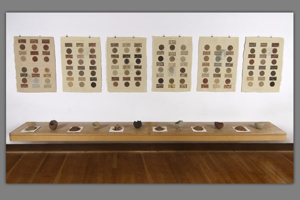 <font color=#bdbdb6 face=Verdana><strong>Ways of Knowing Installation</strong> - Wall mounted work, Munsel Chart Notations, soils and silk screen print - <em>Each panel 76 x 57cm wide - 2006-07
</em><br />
<strong>Mud and Hair Bowls</strong> - 3 Dimensional work, Unfired bowels. Soil from 6 collection points within Abberly and Malvern Hills Geopark, mixed with human hair. - <em>10 x 10cm wide - 2006-07</em>

<br />
<strong>Burnt Earth</strong> 6 soil samples fired at 500 degrees C. <em>- 6 soil samples 300 grms each sample</em></font>